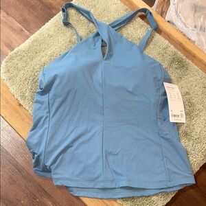 Women’s size large crossed, tankini Athleta brand teal in color